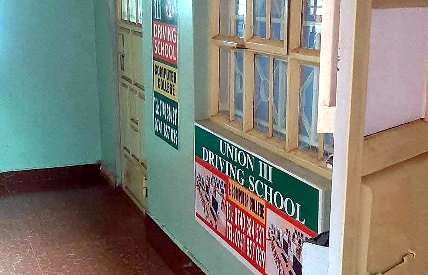 Union III office corridor and school signage with no people visible